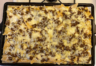 Photo of a sheet pan with ground meat nachos from Nachos for Dinner by Dan Whalen