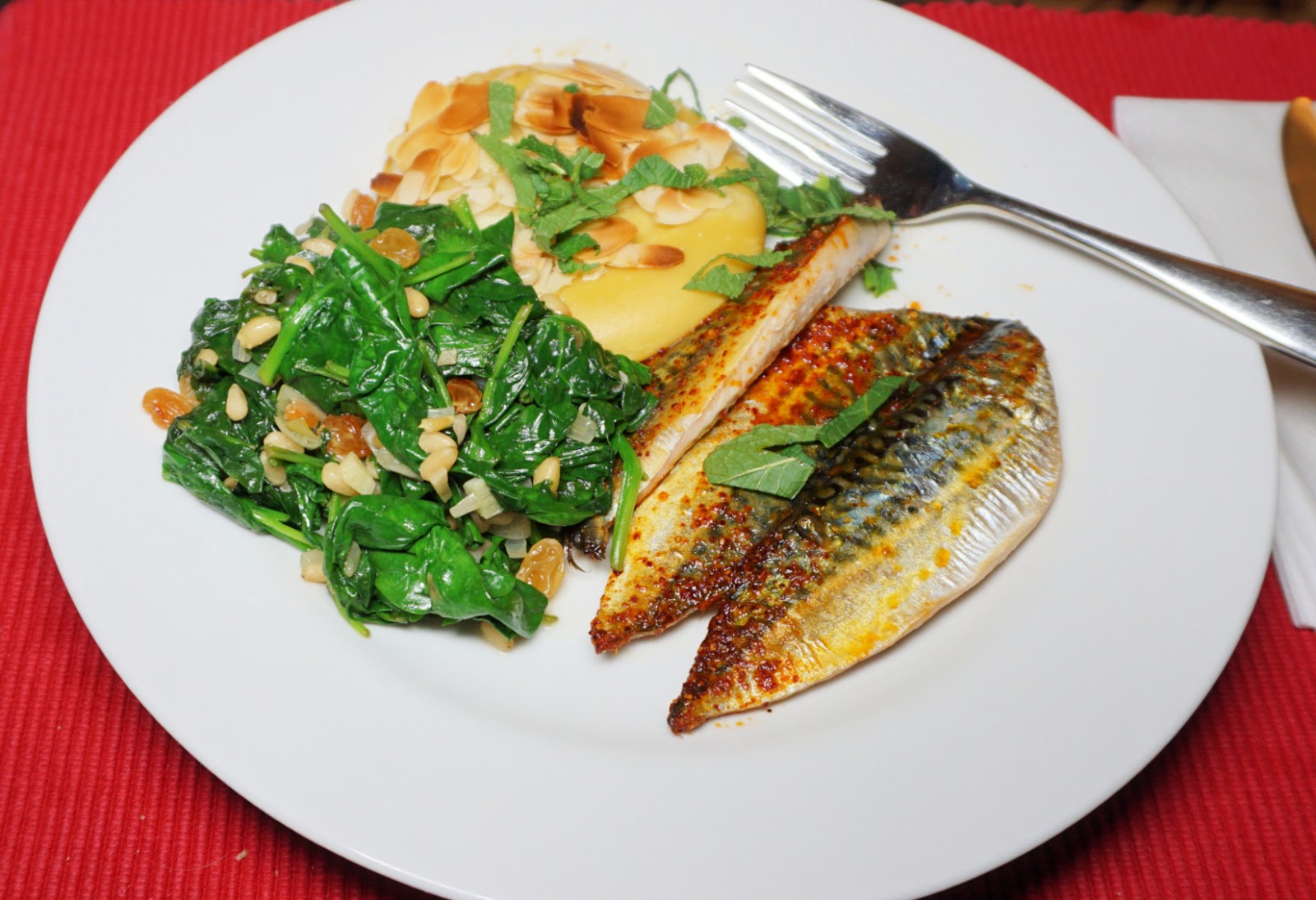 Spinach with pine nuts and golden raisins