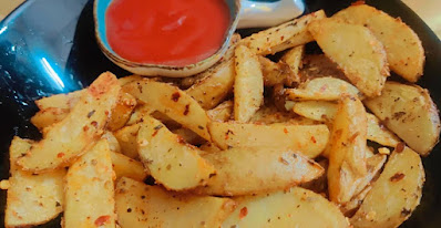 Baked Potao wedges recipe by vegonplate