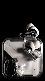 Black ANd White earbuds with a transparent stem and a transparent case.