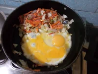Egg added to make egg scrambles for Egg Noodles Recipe