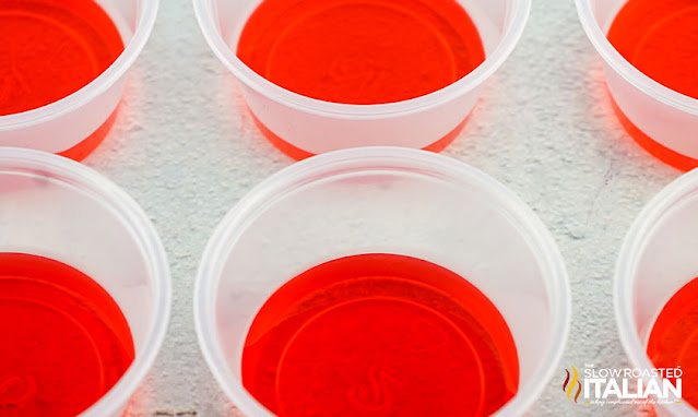 red layer of tequila jello in plastic cup