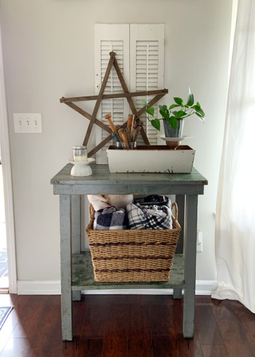 Early Spring Home Decor - flea market table with layered vignette