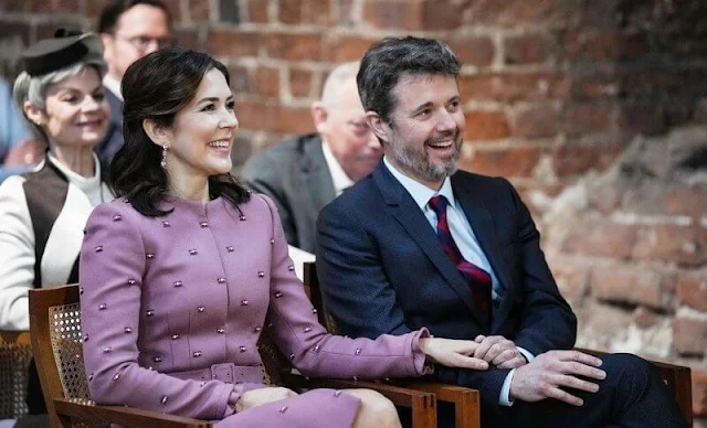 Crown Prince Frederik and Princess Benedikte. Crown Princess Mary wore a dusty pink coat dress. The iconic ruby set