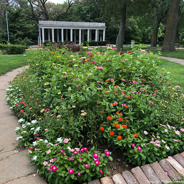 Stately gardens and an elegant portico charm visitors at Mount Vernon Gardens in Omaha, Nebraska.
