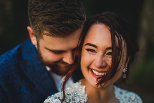 Bride and groom laughing