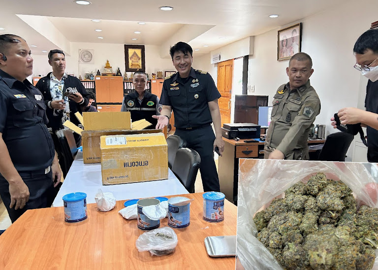 Police display cannabis concealed inside glucose powder, bound for Laos.
