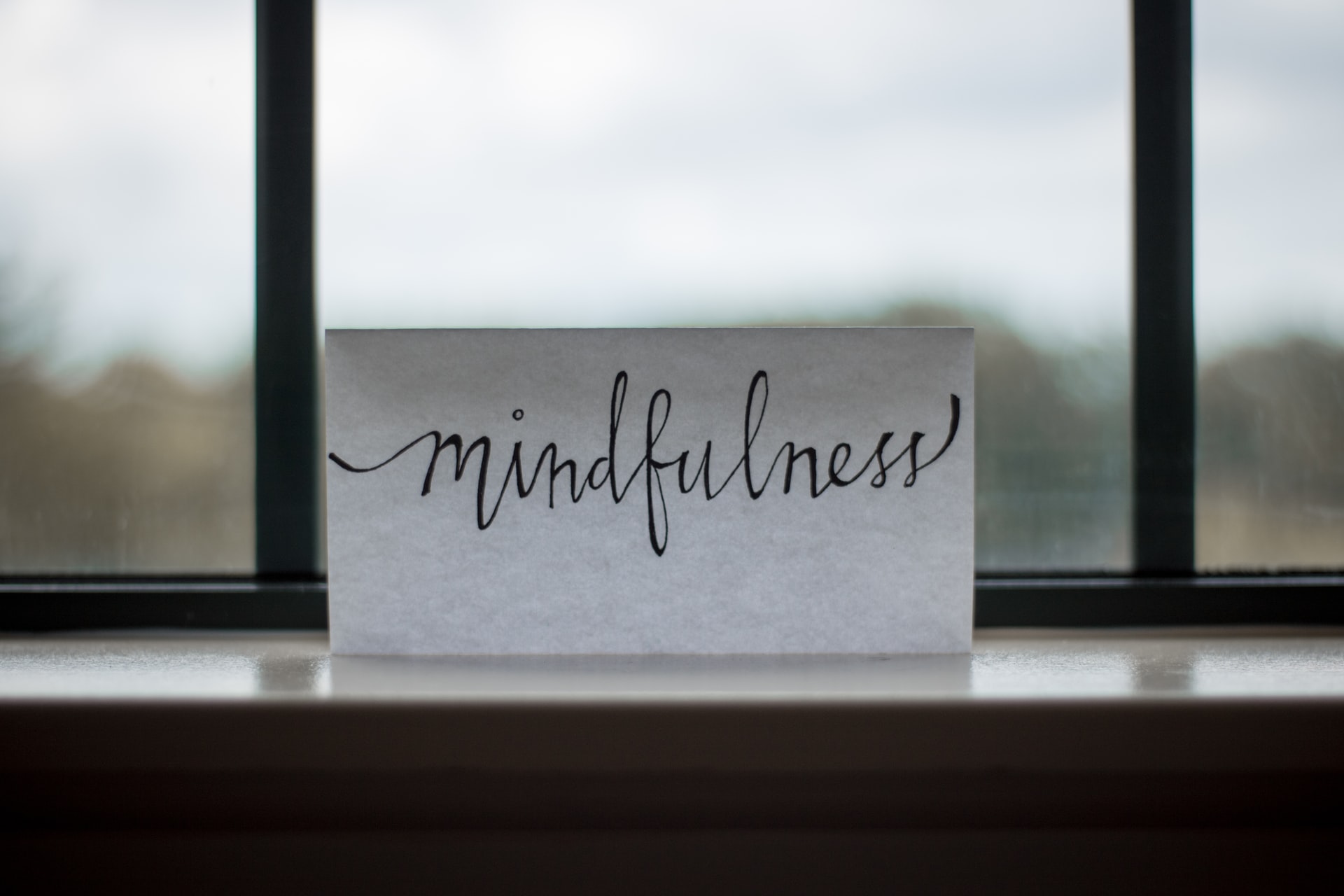 Health Benefits - Mindfulness text and a window