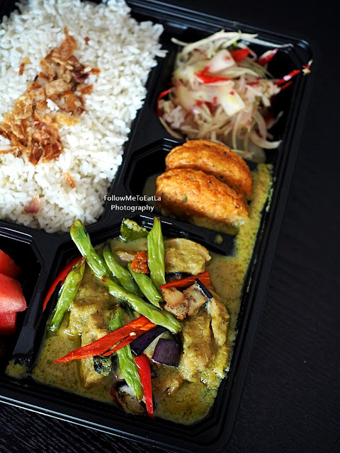 Thai Green Curry Chicken Green Curry Chicken, Thai-style Fried Fish Cake and Kerabu Salad. Served with Steamed Rice and Mixed Cut Fruits