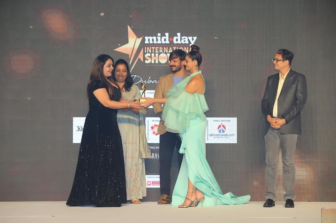 PRO Naghma Khan was honored with the Mid Day Showbiz Award at the hands of Vivek Oberoi and Daisy Shah, in Dubai