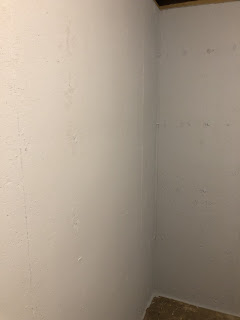 Storm shelter basement walls painted with Zinsser waterproofing paint