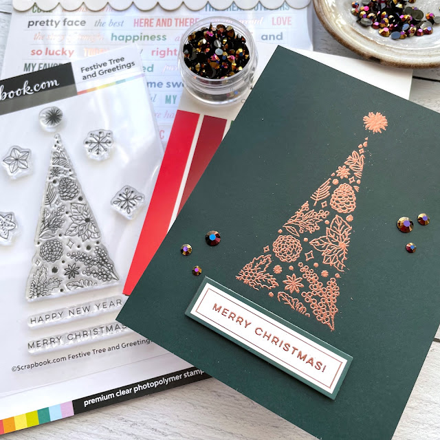 Christmas Card made with: Scrapbook.com Festive Tree and Greetings stamp, Jewel Sticker Book, Christmas smooth cardstock; Pinkfresh jewels; Ranger super fine copper embossing powder