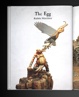 A picture of a Compendium page depicting "The Egg" a diorma of a Giant raiding a nest, being attacked by a griffon after breaking an egg.