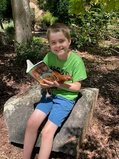 James Harris reading Snotlings by Tarryn Mallick with Xena the warrior chicken