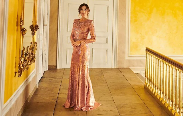 Crown Princess Mary wore a new clove velvet suit by Temperley London, and a georgia sequined pink gown by Jenny Packham