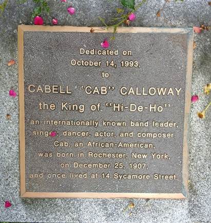 A plaque on a concrete surface

AI-generated content may be incorrect.