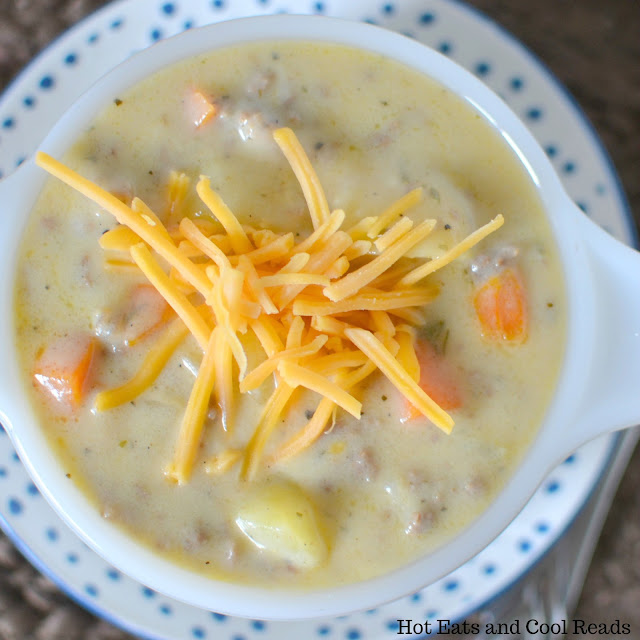 soup in a bowl garnished with cheese.