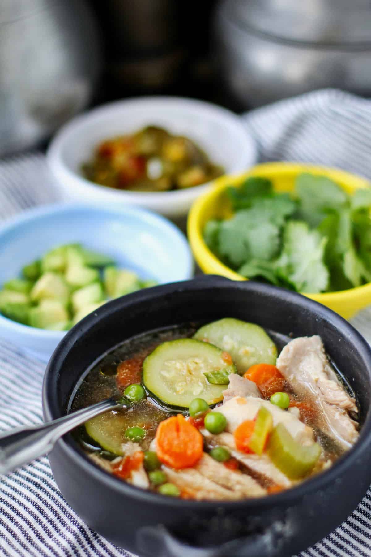 Mexican-Style Chicken Soup in bowls.