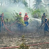 Babinsa 01 /Ranai Kodim 0318 Natuna Bersinergi dengan warga Lakukan Pemadaman Kebakaran Lahan