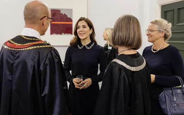 Crown Princess Mary wore a new crystal-embroidered pleated crepe midi dress by Red Valentino. Dulong Esme gold earrings