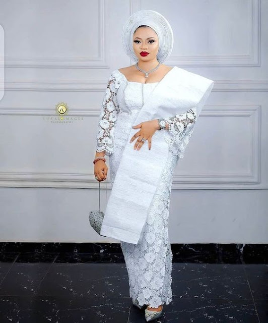 Latest Lace Gown Styles 2022 For Ladies In Nigeria.