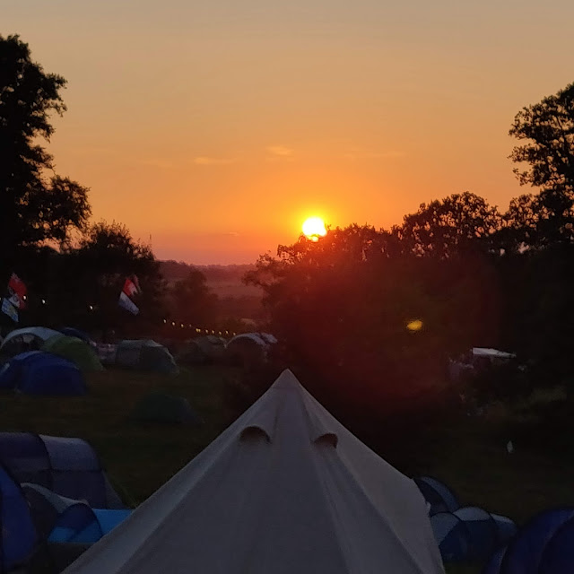 Sunset over campsite at Cornbury Music Festival