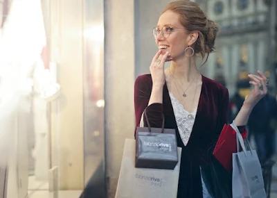 A Fashionable Women Carrying Different Tote Bags