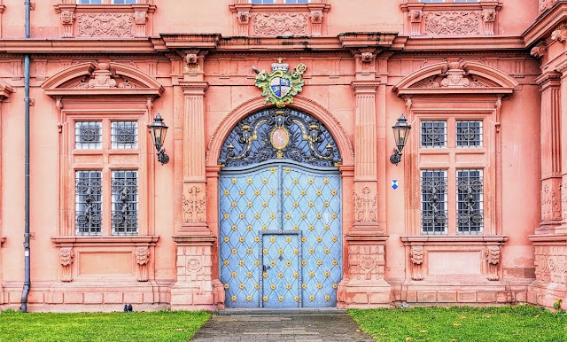Blue door with yellow dots at Kurfürstliches Schloss in Mainz Germany