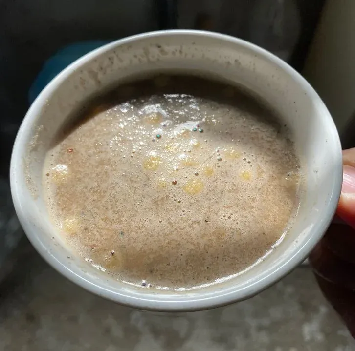 A mug of Greenmax cereal drink