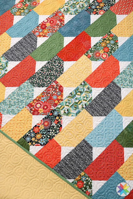 Top Notch quilt pattern by Andy Knowlton of A Bright Corner - a layer cake or fat quarter quilt pattern in four sizes