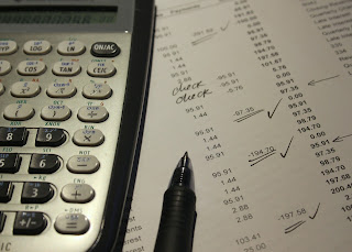 Calculator and ledger | Collection companies Michigan