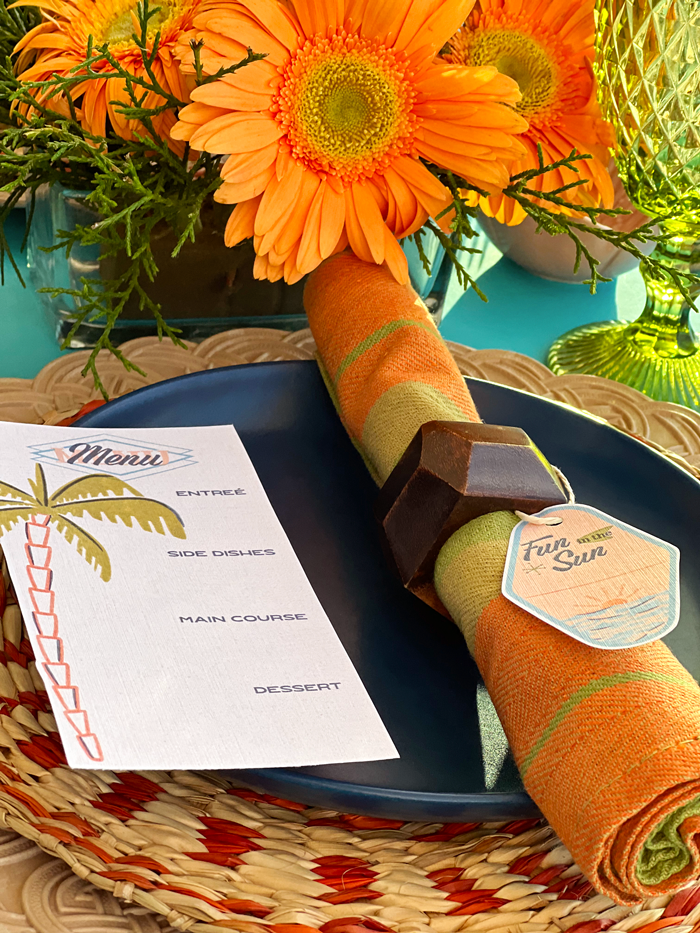 free brunch printable, retro, vintage motel keychain, palm trees, Palm Springs, Florida, menu, place cards, orange yellow gerbera daisies, flowers, table setting, tables cape