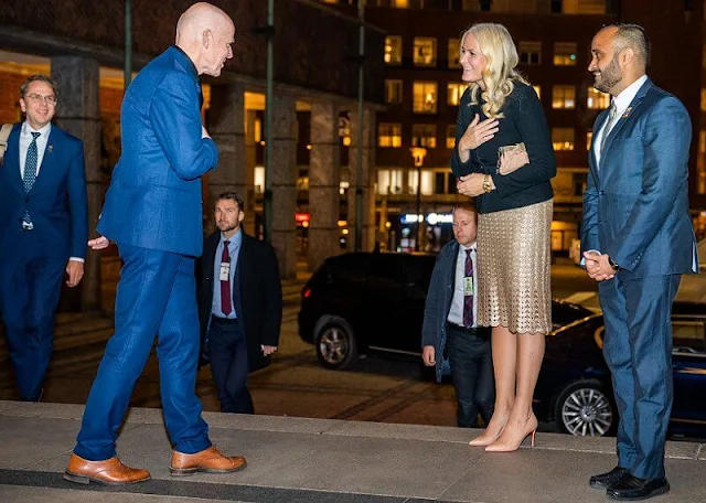 Crown Princess Mette-Marit wore her Prada jacket with her Prada skirt and her Prada bag. She also wore her Louboutin pumps