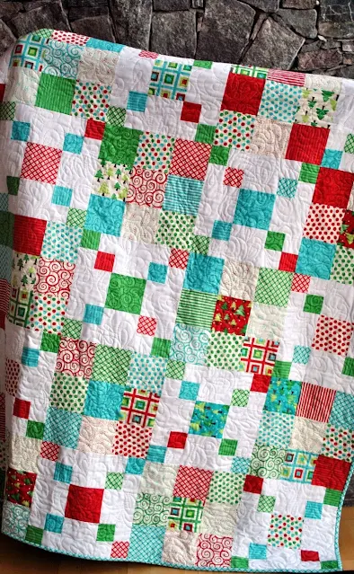 quilt with nine patch and four patch blocks