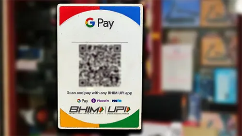 A google pay scan board in front of a shop