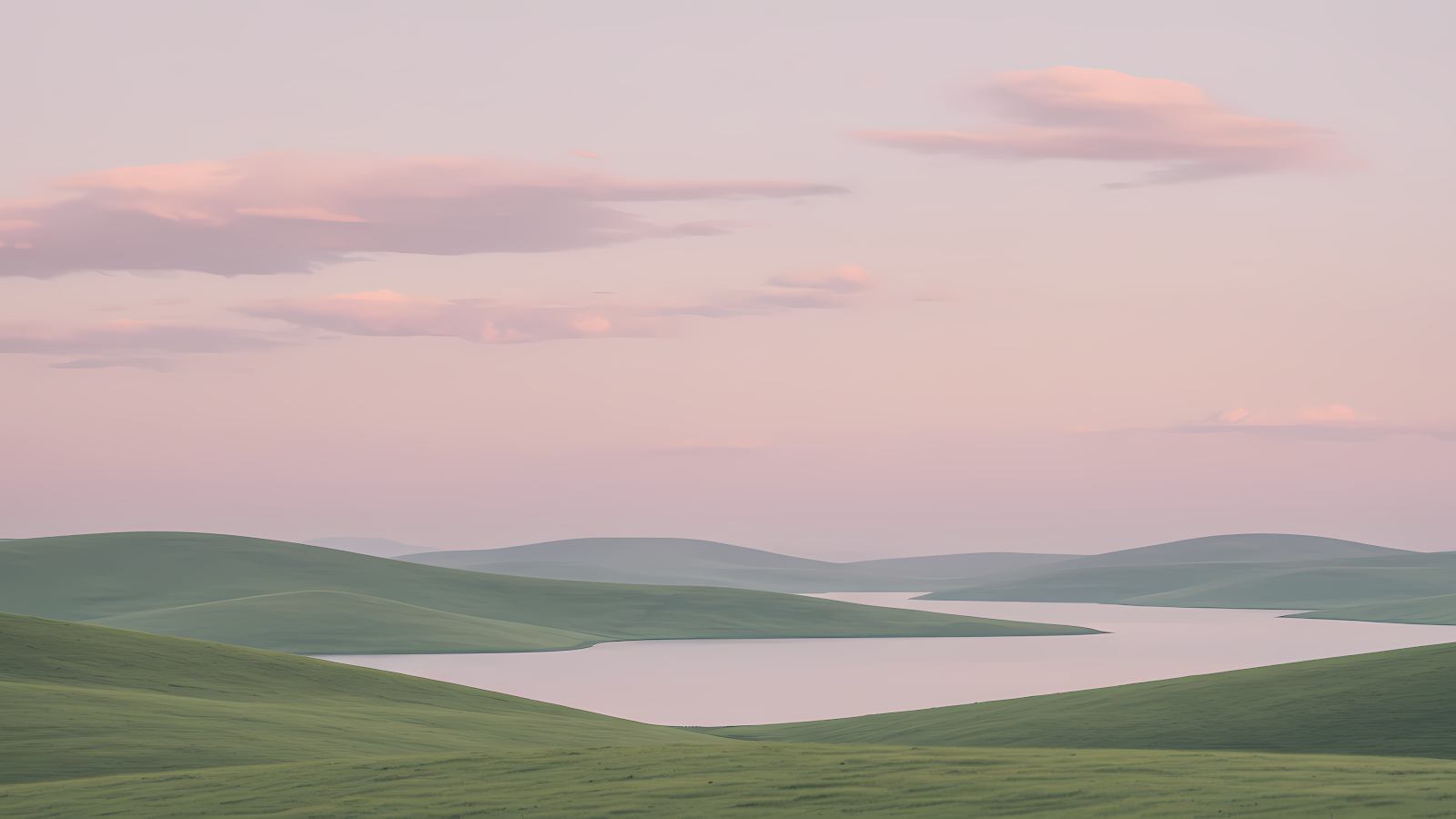 Download 4K minimalist pastel hills and lake wallpaper, featuring a serene and simple landscape with gently rolling green hills meeting a calm, light-colored lake under a soft pastel pink sky with a few wispy clouds.