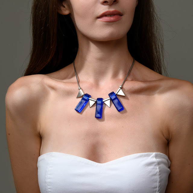 woman wearing necklace