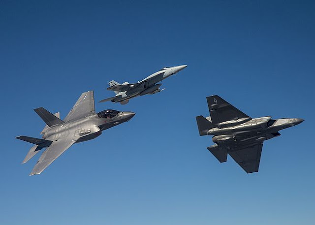 F-22 Raptor fly with F-35 and F/A-18
