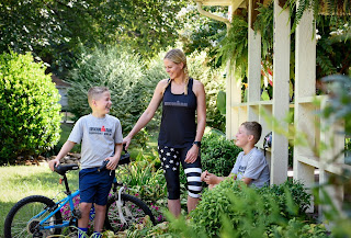 Jerry Mcsorley's wife Shannon Spake outside the house with their kids