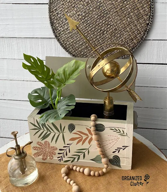 Photo of a thrifted wooden box upcycled with Dixie Belle Chalk Dried Sage and Drop Cloth Paint and Redesign with Prima Greenery House Decor Transfer.