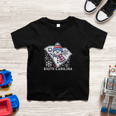 Fun black kids' tee with South Carolina state snowman graphic and snowflakes