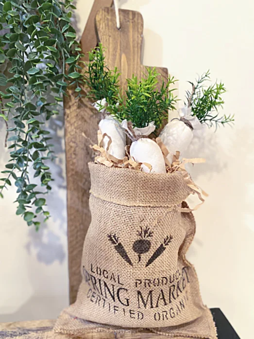 burlap bag of white carrots