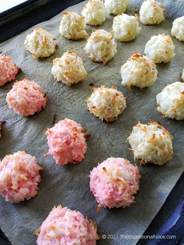 Baked pink and white coconut macaroons