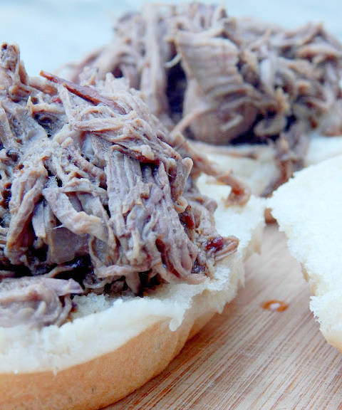 Shredded roast beef on buns for sandwiches