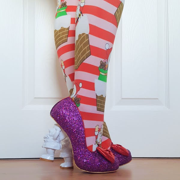 wearing purple glitter court shoes with red trim and plain white Santa heel to decorate
