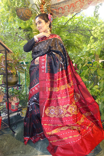 Black, red, white, and hints of golden yellow- Sambalpuri silk saree with pasapalli borders