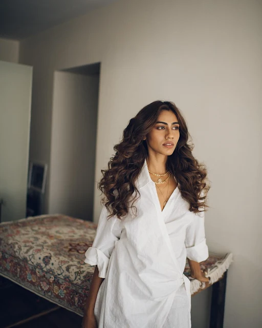 Apeksha Porwal in hotel room in white dress