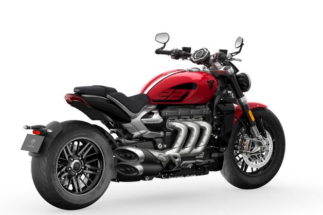 Triumph Motorcycles Rocket 3 R and Rocket 3 GT 221 Special Editions are designed to celebrate The world-renowned image of the Rocket 3 motorcycle lineup features a world-leading powerful engine of 221 Nm of torque with a unique and vibrant color theme. It is scheduled to be released for only one year.     uvHVfD.png elegant style It comes with the distinctive color theme of the 221 model .   Bright red that looks luxurious like Red Hopper paint on the body and front fenders. Graphics on the model's knee pads 221 that is unique and distinctive The 221 graphic motif represents the Rocket's incredible performance figures: power, torque, engine size. Cylinder size and stroke Fender bracket, Sapphire Black, front lamp, front windshield, side panels, rear body and radiator fairing All the elegant details of the Rocket 3 include Distinctive twin headlights Three molded exhaust pipes, single-arm swingarm and foldable footrests.    unrivaled performance  Motorcycle with the highest torque in the world with a torque of 221 Nm at a speed of 4,000 rpm. The world's largest motorcycle engine, 3 cylinder engine, 2,458 cc. Maximum power of 167 horsepower at 6,000 rpm. The distinctive 3-pipe hydroform exhaust pipe delivers a powerful, deep roar. High-efficiency 6-speed helical gear set Hydraulic clutch for relief Excellent car controls  Adjustable Showa single monoshock rear suspension with separate oil reservoir. Showa 47mm adjustable front fork. Brembo Stylema ® 4-cylinder front brake calipers , highest specification Fuel tank capacity 18 liters to increase the distance traveled. Lightweight 20-spoke die-cast aluminum wheels with 240mm rear tire for elegance state-of-the-art driving technology  Versatile TFT instrument cluster with optional connectivity for My Triumph Connectivity. ABS system in cornering and the traction control system in cornering Four driving modes: Road, Rain, Sport and Rider configurable. Standard high specs which consists of All LED lighting systems, Hill Hold Control, cruise control Keyless starting and locking system Temperature-adjustable thimble (only GT model) and USB charging port. Genuine Triumph accessories from more than 50 entries.  Original accessories for added comfort Practicality, style and safety, as well as a luggage bag for riders who want to travel longer and take longer rides. The 221 Special Edition (221 Special Edition) motorcycle is only available for one year. Both models have a unique combination of color themes. To illustrate the numbers that represent the water class of the Rocket model (Rocket) with a bold and luxurious individuality. Provides excellent vehicle handling for unrivaled driving performance. Named after the world's highest torque of 221 Nm, the Rocket 3 R and Rocket 3 GT 221 Special Edition. The steep (Rocket 3 R, Rocket 3 GT 221 Special Edition) is a premium motorcycle that is eye-catching and a rider's favorite.  uvH8Gy.png elegant style It comes with the distinctive color theme of the 221 model that stands out.  The specific color theme of the Rocket 221 Special Edition is characterized by Red Hopper paint on the body and front fenders. It contrasts beautifully with the Sapphire Black paint of the fender bracket, front lamp, front windshield, side panels, rear bodywork and radiator fairing. The theme is also designed to be more attractive and interesting with the aesthetics of the 221's special patterned knee pads, as well as subtle graphics on the body. That represents the number that represents the Rocket's class-leading performance, with a torque of 221 Nm, a 2,458 cc engine, a maximum power of 167 hp, a stroke of 85.9 mm and a displacement of 110.2 mm.  In addition to the iconic color theme of the 221, this model features all the distinctive features and styling that make the Rocket the new icon of a modern motorcycle. and bouncing beautiful twin headlights Three molded exhaust pipes and the attention to detail are standard on all Triumph models, including retractable footrests. When folded, it blends into the body seamlessly with the design of the Rocket car.  uvHJCa.png unrivaled performance  Building on Triumph's reputation as the world's largest motorcycle engine manufacturer, the Rocket 3 R and GT models deliver world-class performance. from low cycle long until every cycle It's these strengths that make the newest 221 Special Edition praise.  In addition to the 3 cylinder engine, 2,458 cc, will have the most torque in the world at 221 Nm at a speed of 4,000 rpm. The horsepower of this engine is also worth watching. With a maximum power of 167 horsepower at 6,000 rpm, the Rocket 3 R and GT (Rocket 3 R, GT) deliver excitement and excitement. Provides excellent smoothness and responsiveness while driving. which is suitable for all driving styles.