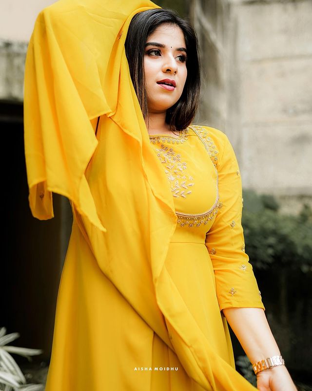 Aparna Thomas Yellow Color Dress Photos