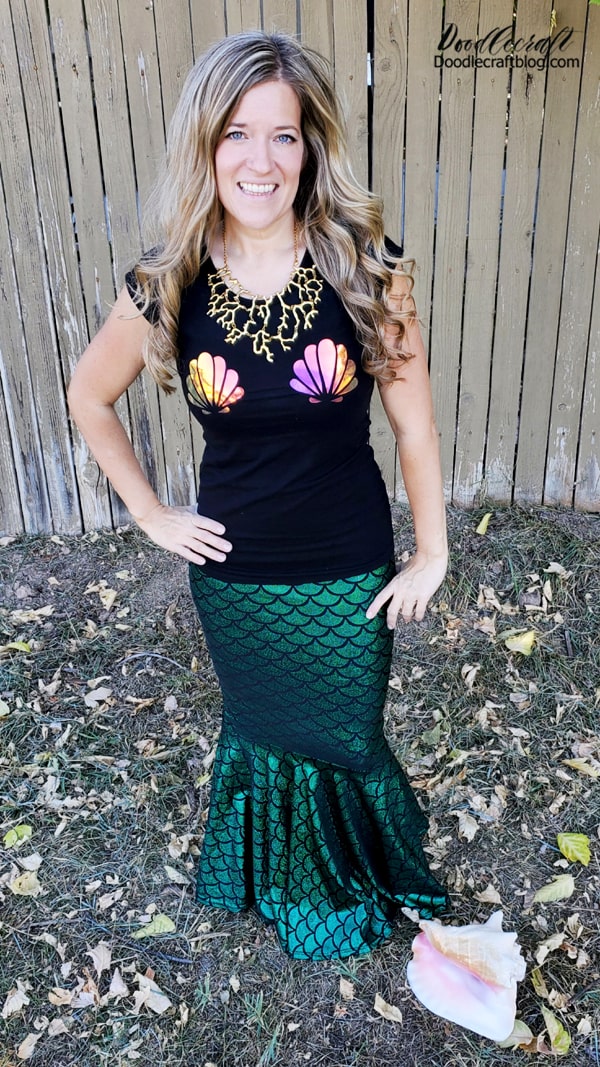 Last Minute Mermaid Halloween Costume made with Cricut Holographic Iron-On Vinyl   I love Halloween, but mostly I love dressing up! Give me any excuse to put on a costume and I am there. This is a simple but really attention grabbing last minute Halloween costume!     It's a breeze to make with the Cricut, seriously, you should own one of these!   Become the queen of the sea with this simple but shiny shirt that takes less than 10 minutes to make. Perfect for the kids Halloween parties or a spooky night out!   Do you like dressing up?